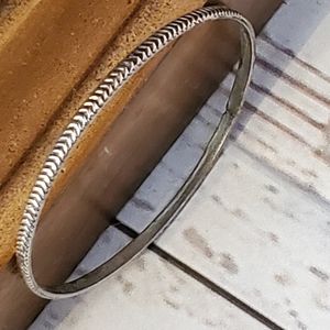 Silvertone arrowhead etched textured bangle bracelet